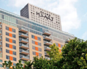 Image of the front of the grand hyatt hotel in san antonio